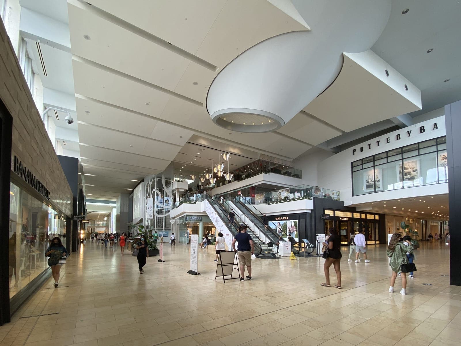 Interior corridor of Yorkdale Shopping Centre in Toronto, storefronts on both sides